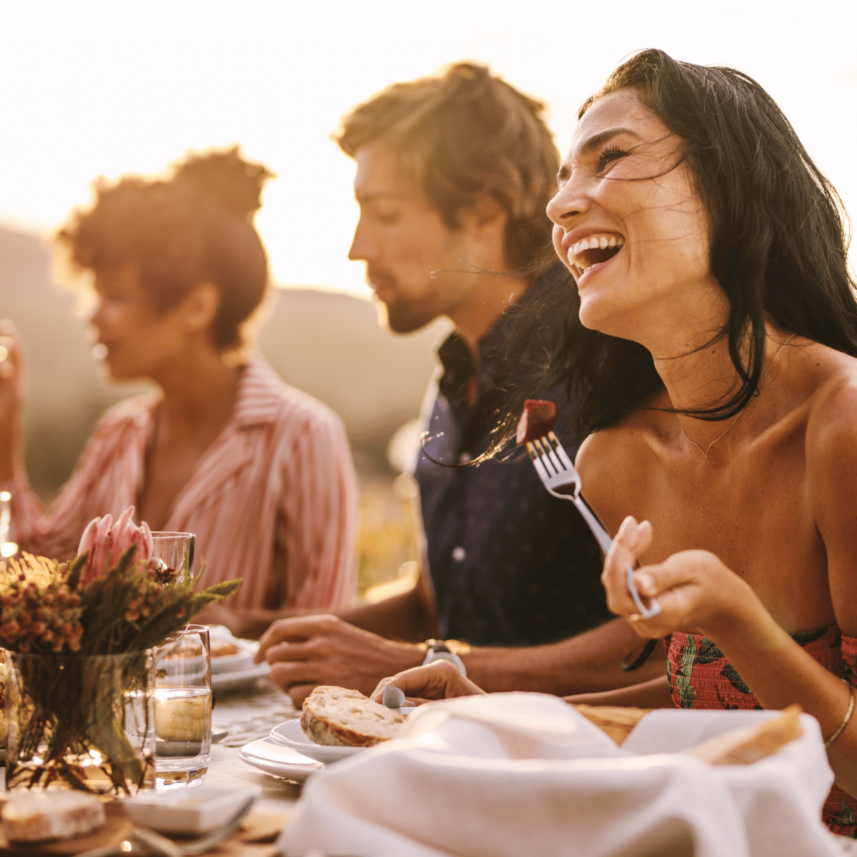 woman laughing at dinner party -  Featured in: Guy Ignores Me But Talks To Others