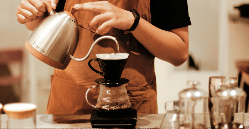 Barista Making Coffee with Manual Brew Process