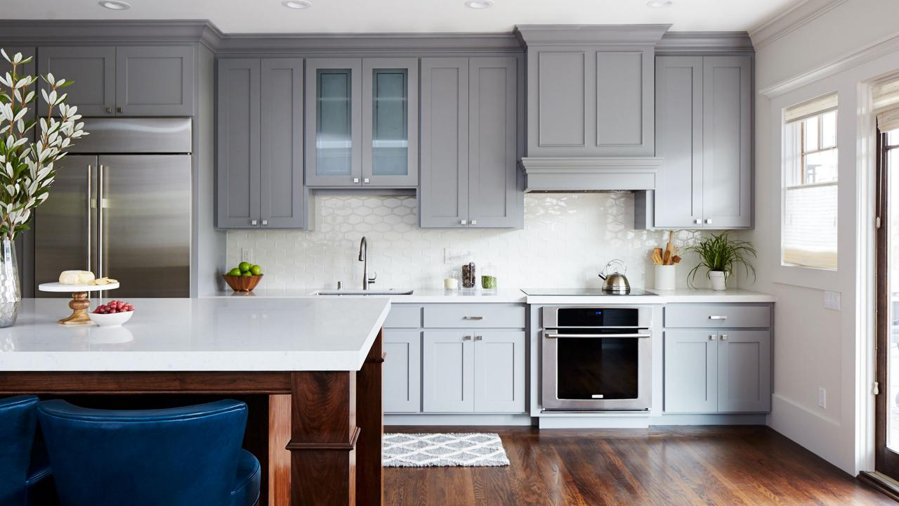 Priming And Painting The Unfinished Kitchen Cabinets