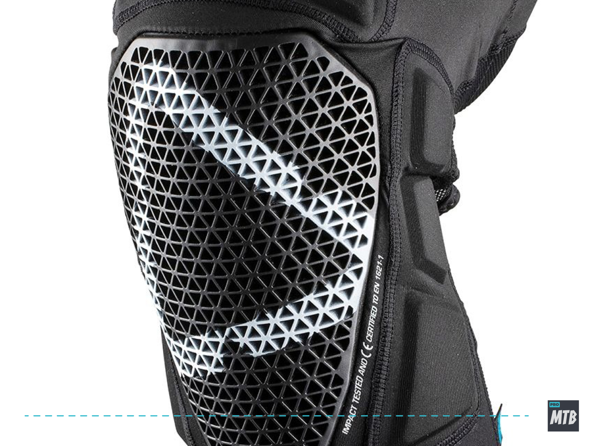 A person wearing mountain bike knee pads with hook and loop straps