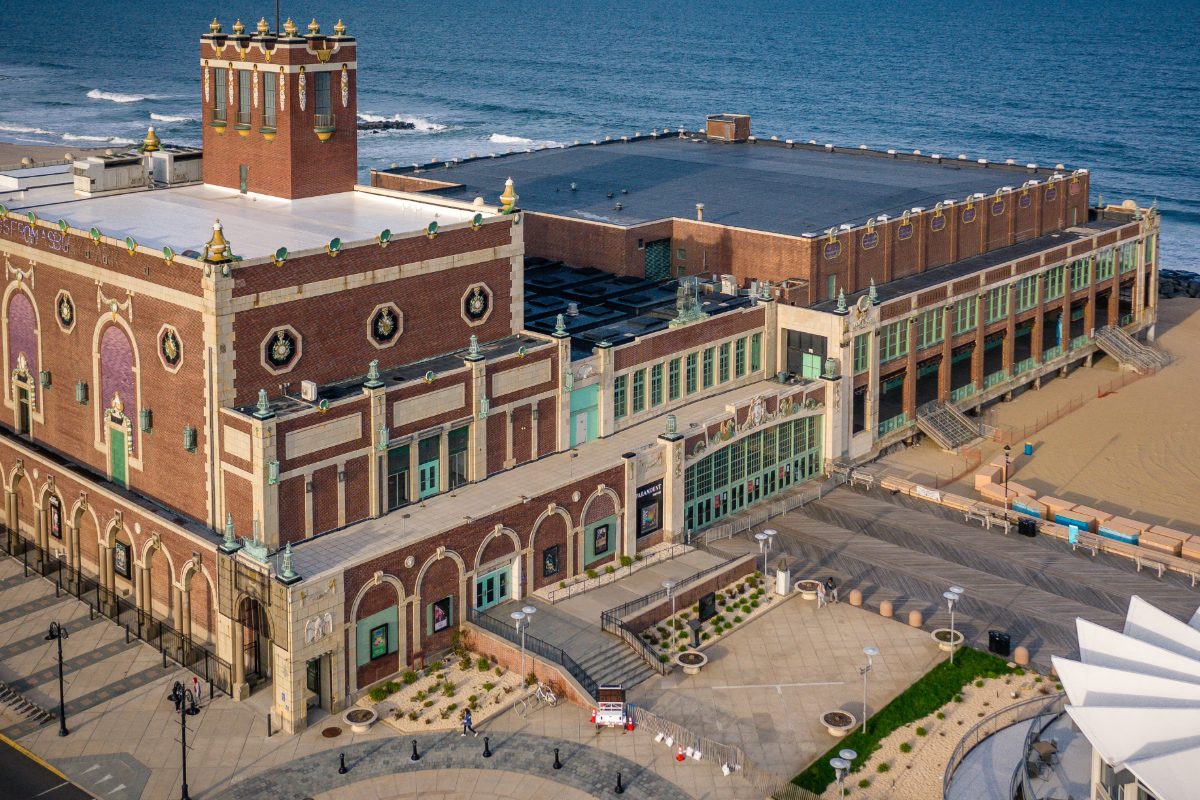 Historic Convention Hall and Paramount Theatre along the Asbury Park boardwalk in winter, overlooking the Atlantic Ocean at the Jersey Shore.