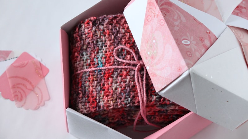 A knitted scarf care package 