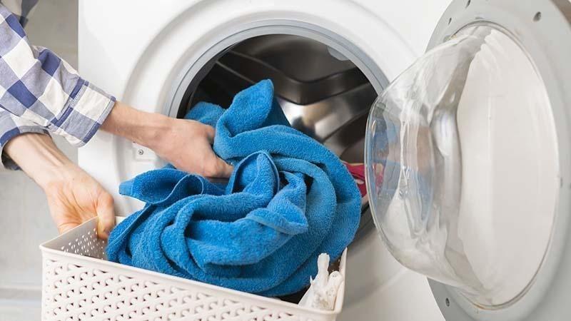 a blue towel in a washing machine