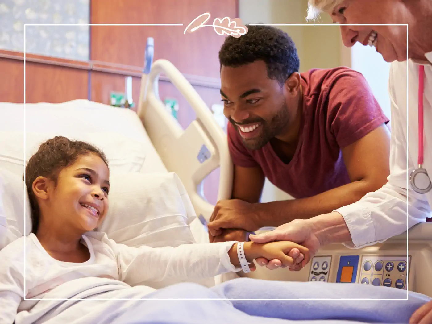 Young girl in a hospital bed holding hands with a doctor, while a man smiles beside her, Fabulous Flowers and Gifts