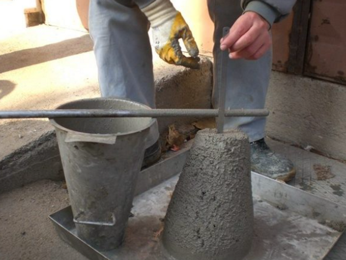 Concrete slump test being performed on a construction site