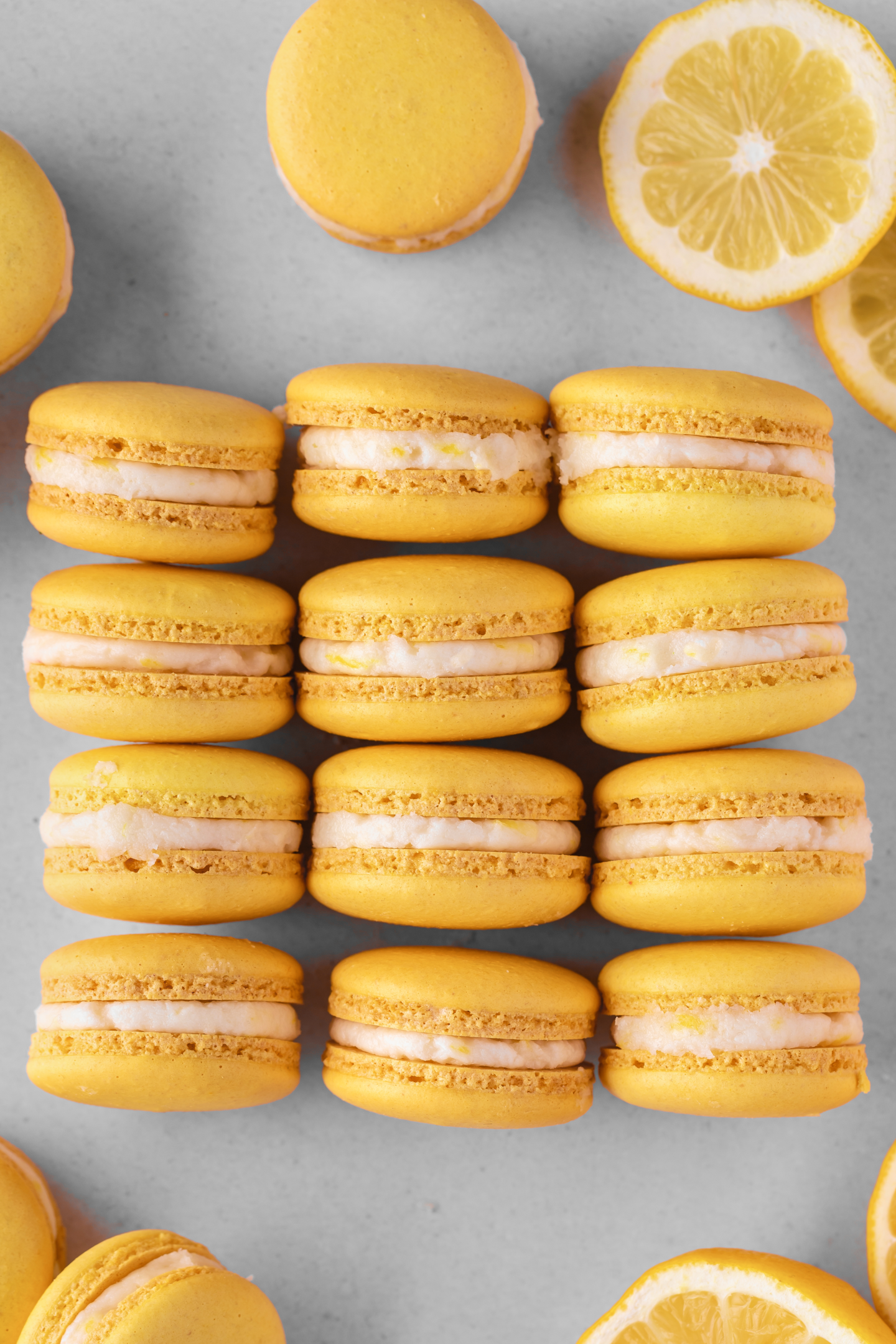 lemon macarons stacked in rows