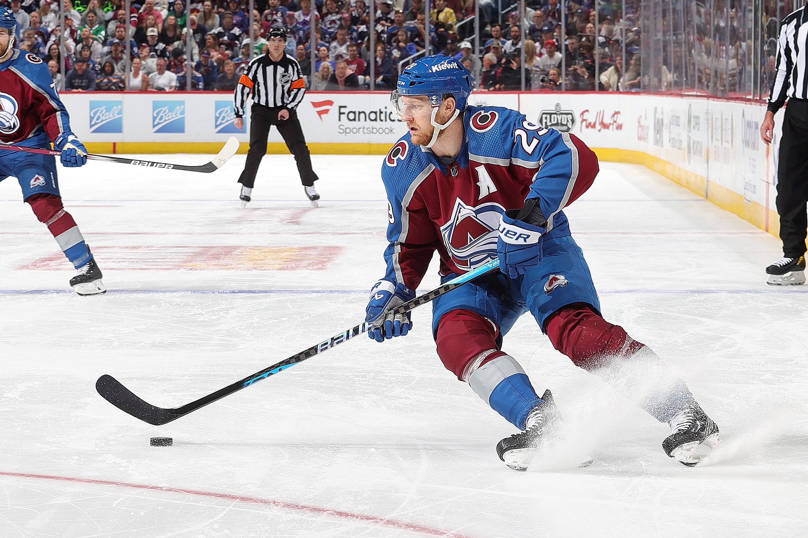 Nathan MacKinnon of the Colorado Avalanche skates against the Dallas Stars in the 2024 Stanley Cup Playoffs.