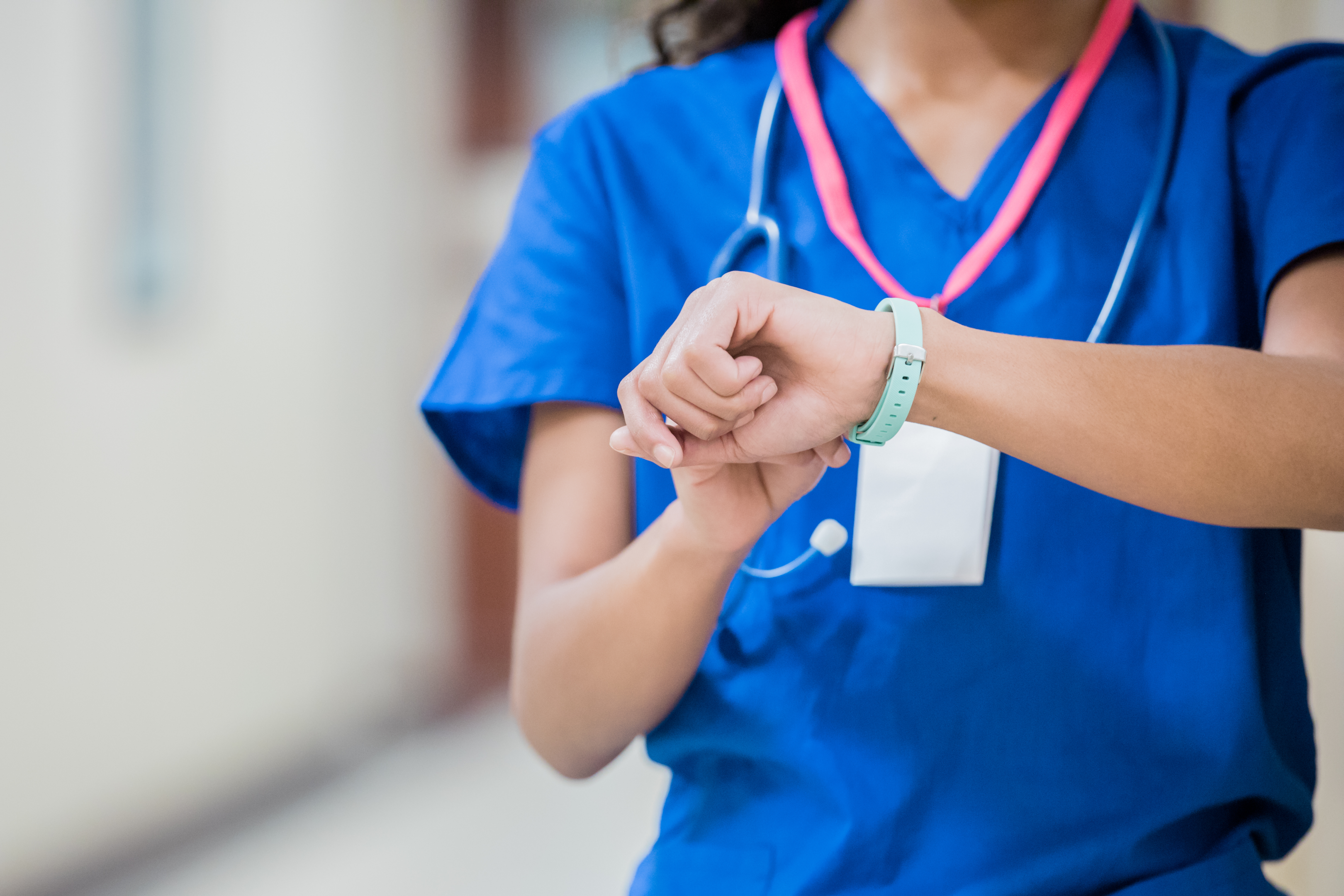 nurse-checking-smartwatch