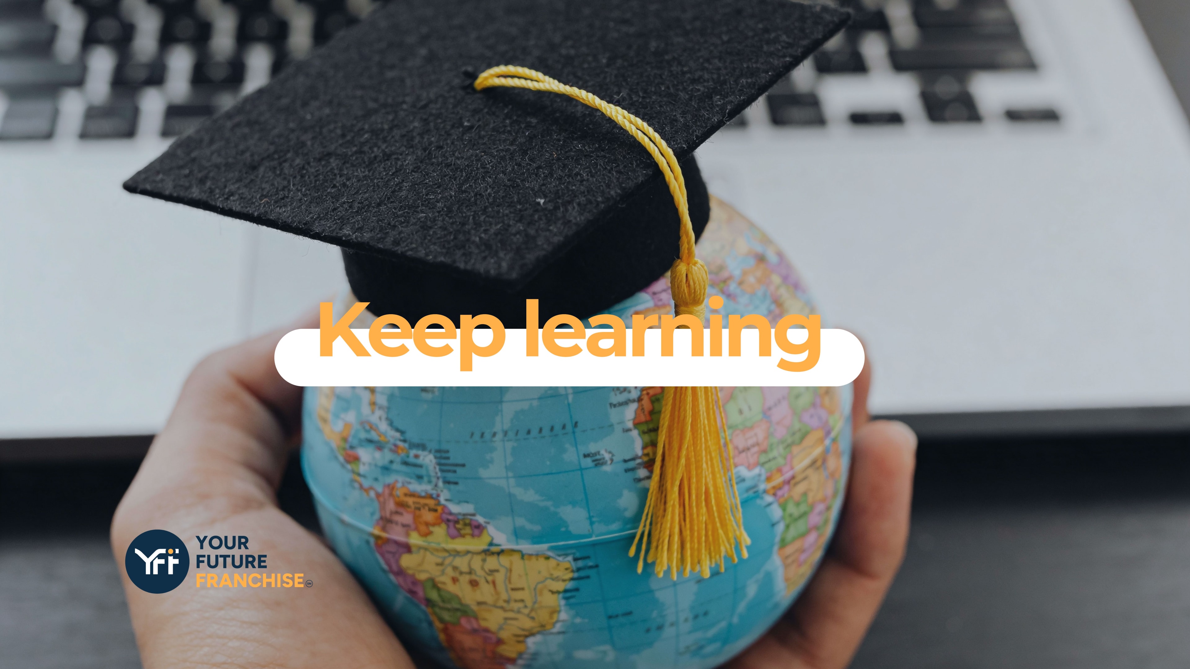 Text "keep learning". Globe with a graduation hat on. 