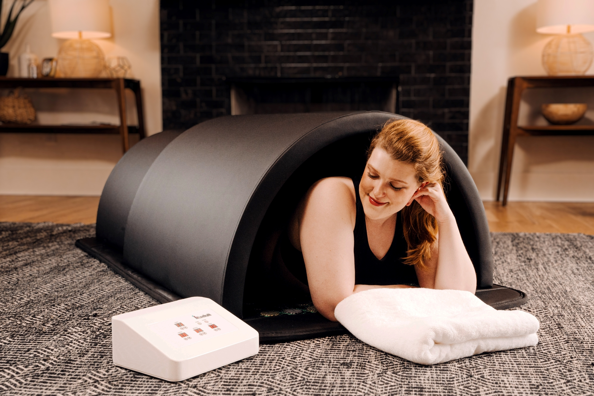 A person sitting in an infrared sauna and a person sitting in a steam sauna