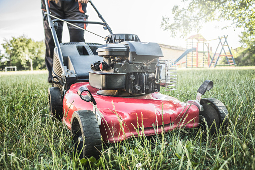 how to make a lawn mower quieter