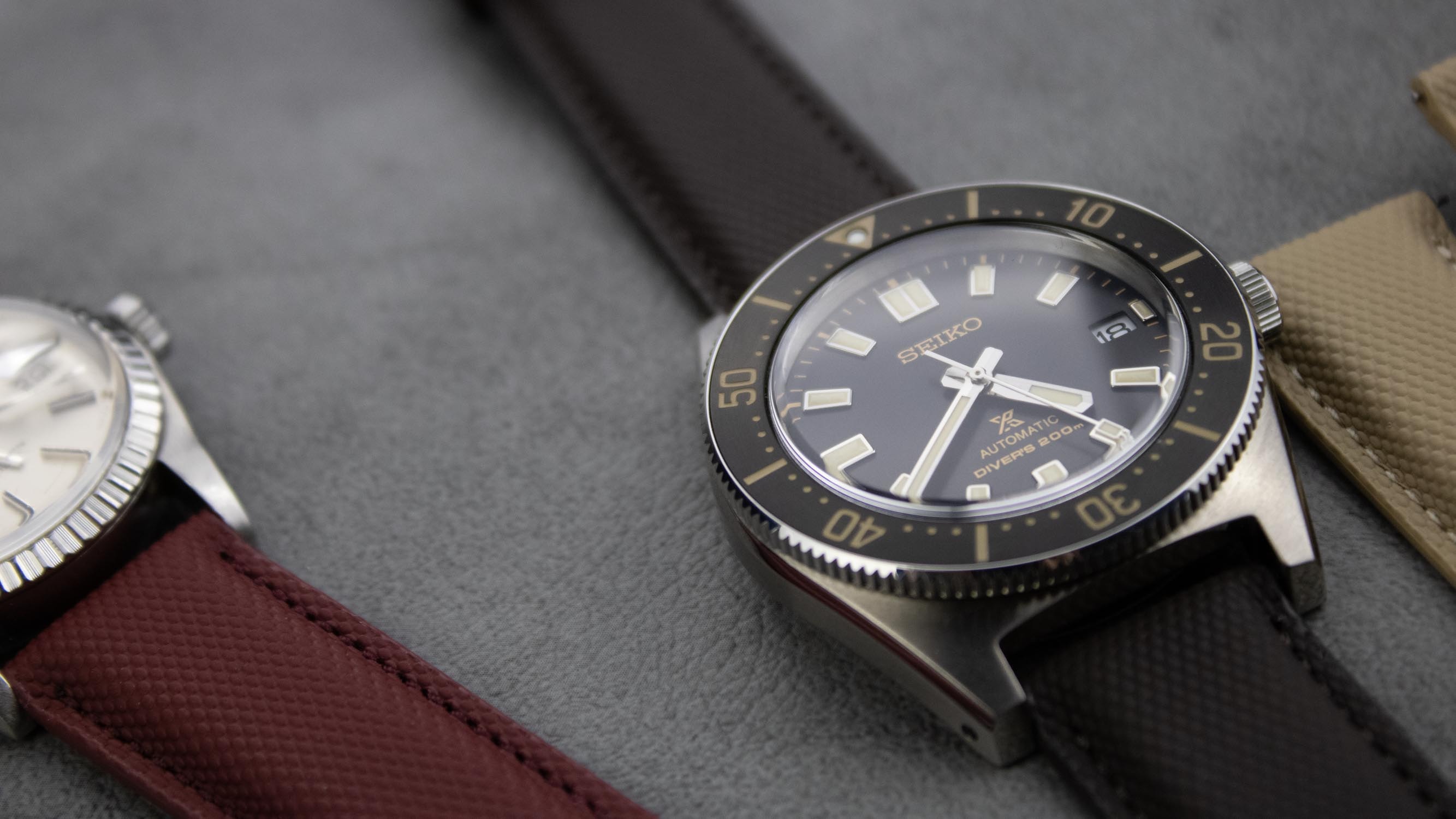 A close-up of a durable sailcloth watch strap showcasing its triple-layer construction.