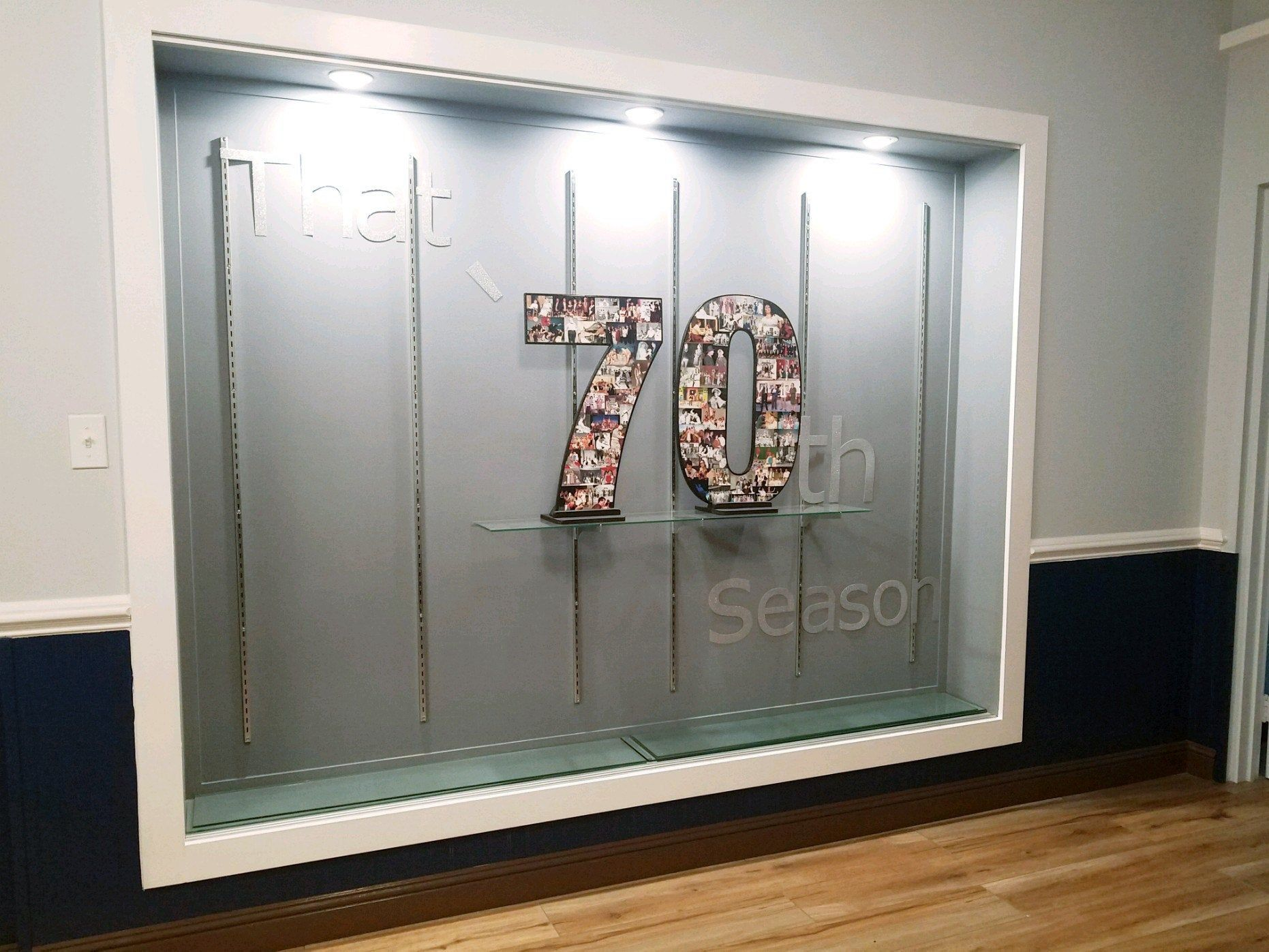 Large Number 70 Display, Covered with a collage of 70 years of plays and production at a historic theater.