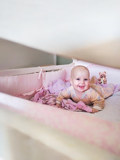 baby in cot
