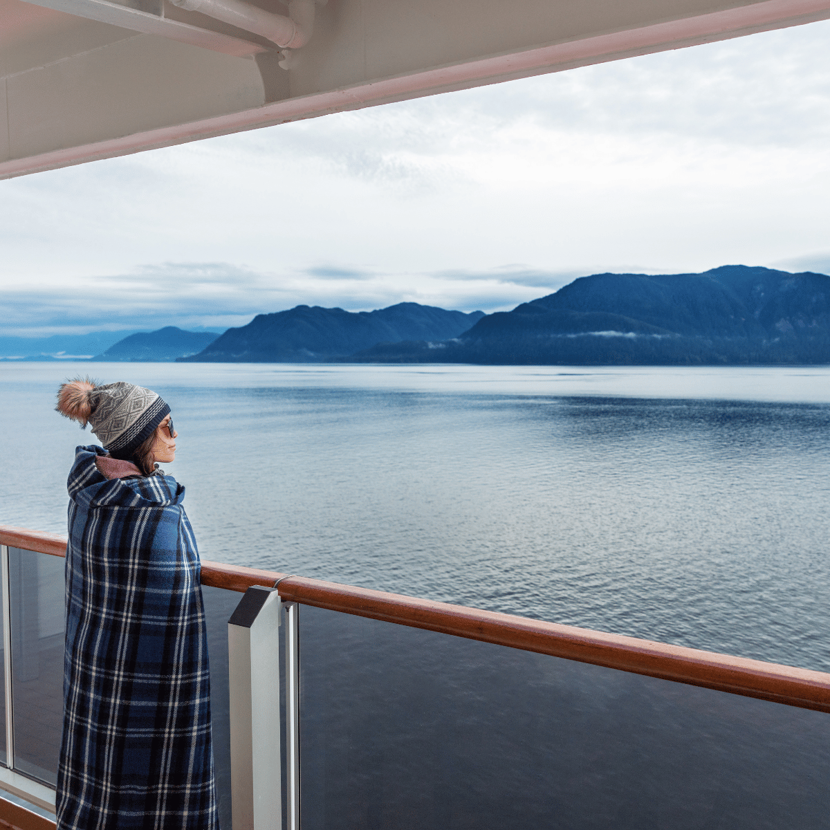 woman overlooking balcony on cruise ship