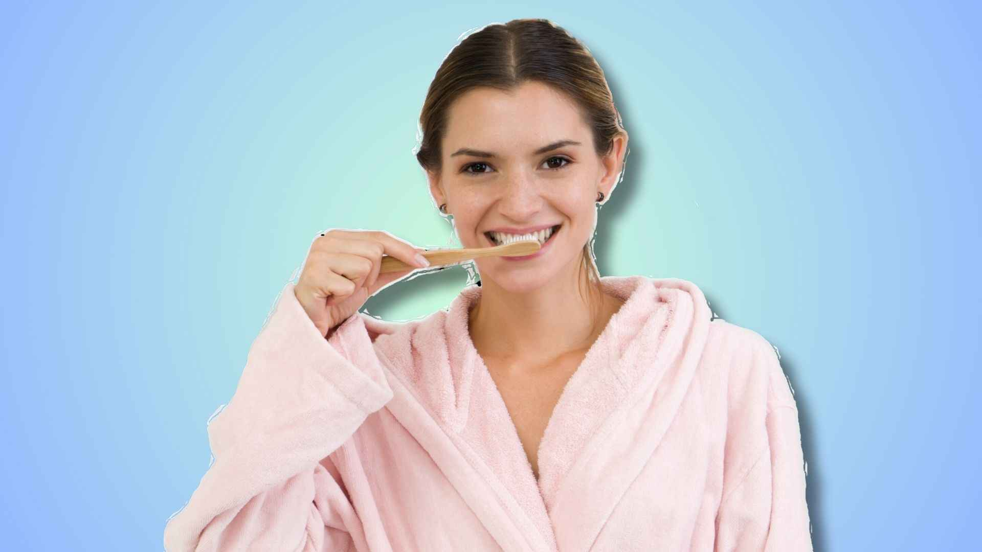 A woman brushing her teeth