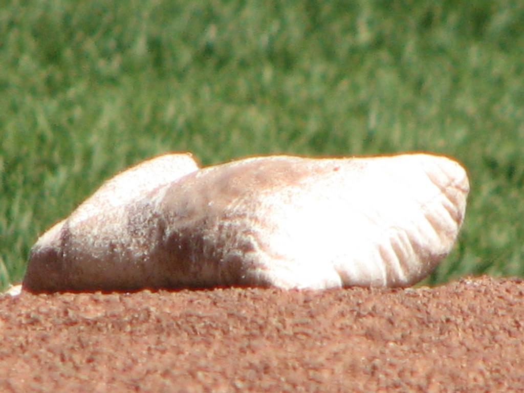 An image of a rosin bag used in the early adoption of sports equipment and later banned due to its performance-enhancing properties.