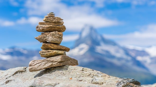 cairn symbolizing the balance between ai generated copy and how an ai copywriting tool can help with marketing efforts