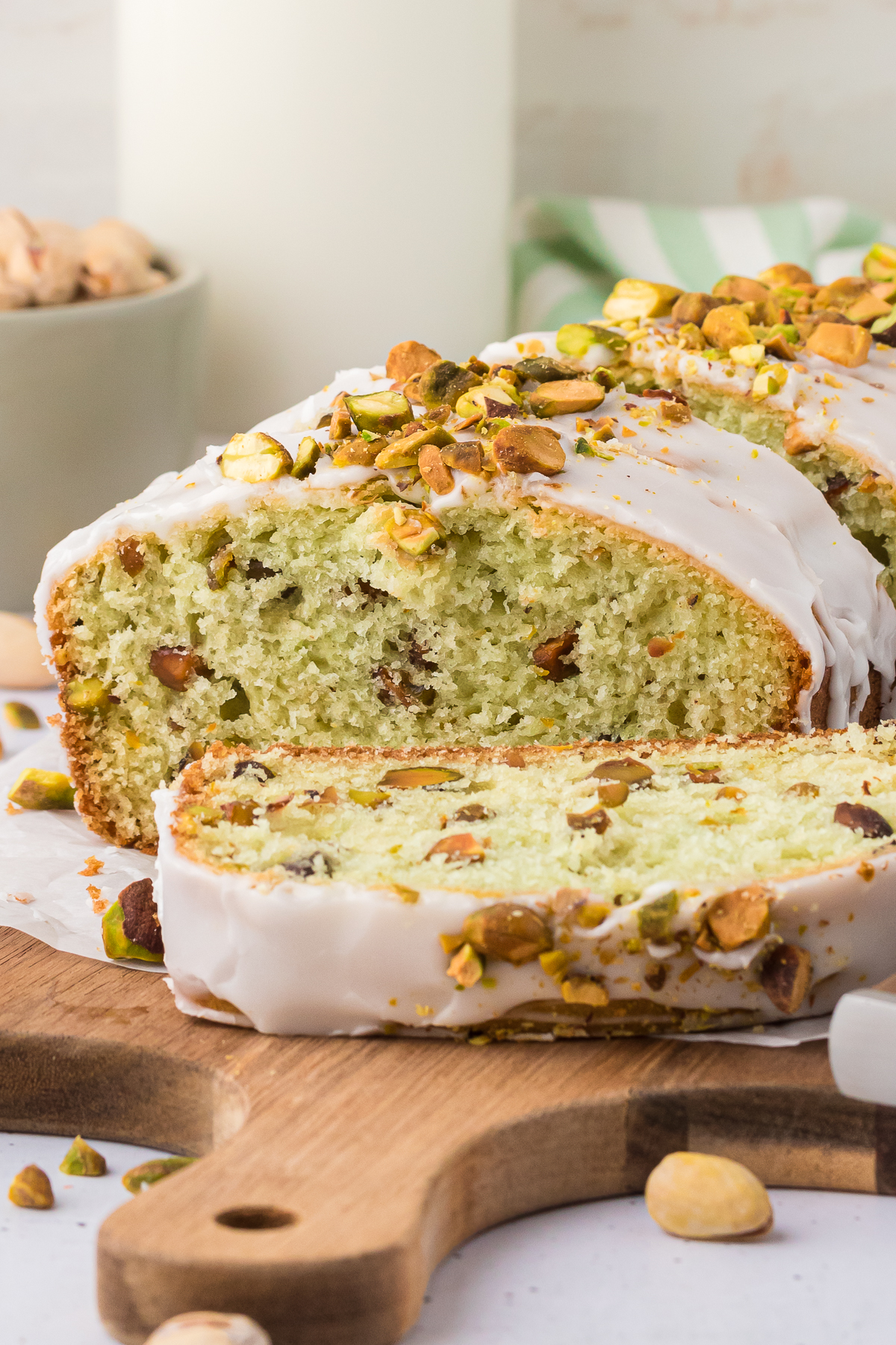 sliced pistachio bread on board