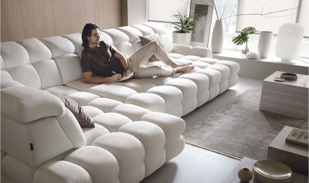 A cozy living room setup with the most comfortable sofa for watching TV.