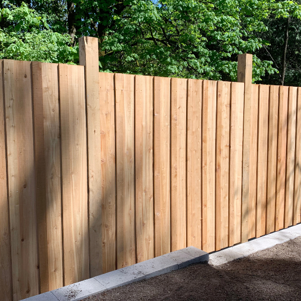 An image showing a wooden fence in a desert landscape.