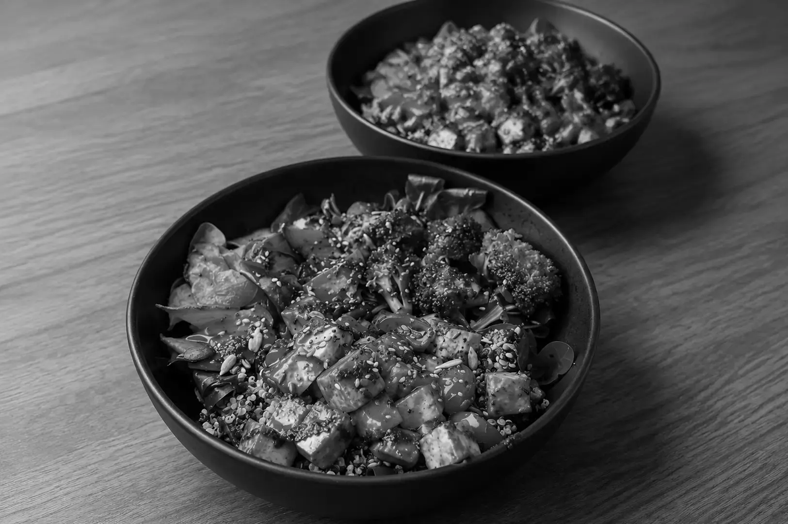 A fully plant-based meal featuring vegetables, grains, legumes, and tofu without animal products.