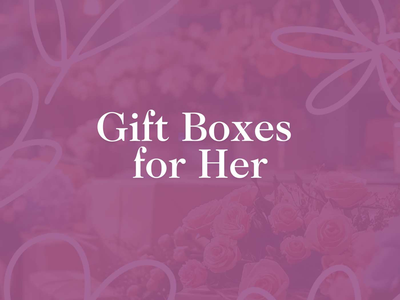 A decorative display of gift boxes surrounded by flowers, representing the Gift Boxes for Her Collection - Fabulous Flowers and Gifts