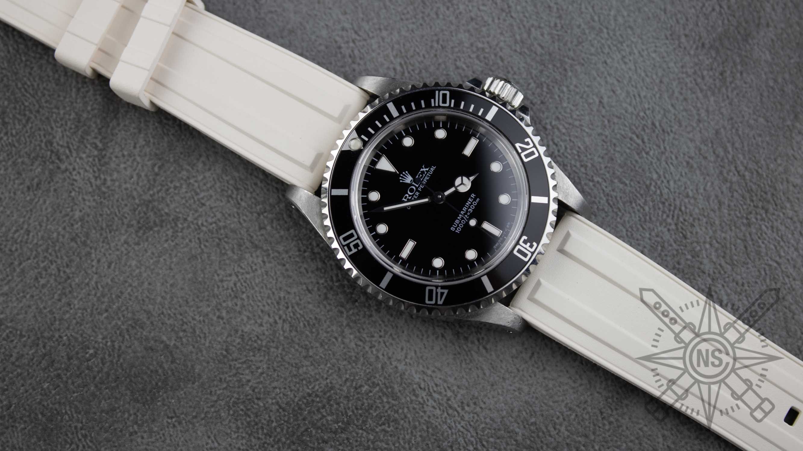 A variety of watches paired with different styles of rubber watch straps.