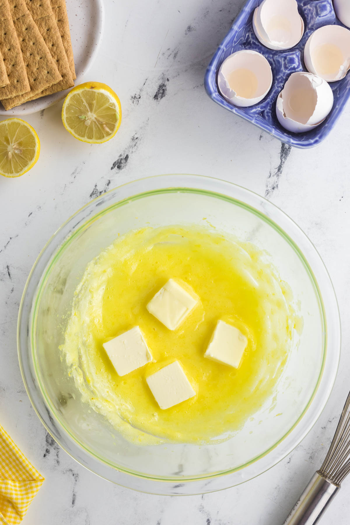 lemon curd with butter on top in bowl
