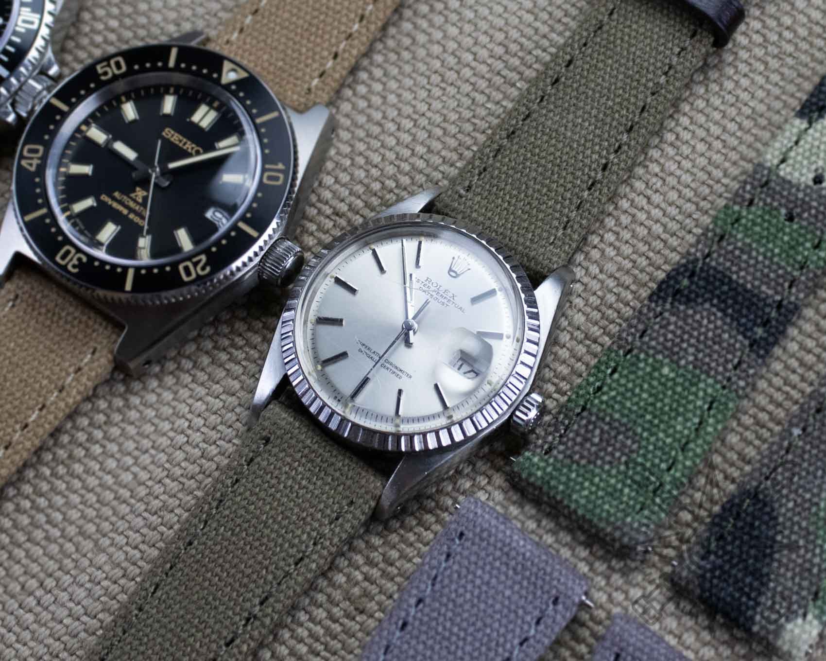 A luxurious watch with a canvas strap, symbolizing affordable luxury.