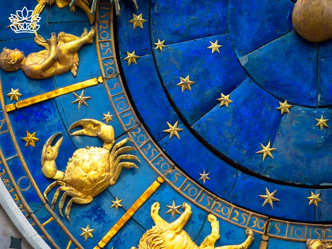 The Cancer zodiac sign in an intricate golden design on a blue background - Fabulous Flowers and Gifts.