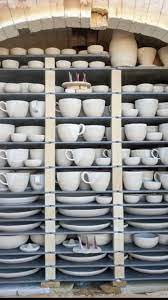 Kiln shelves and posts for stacking ceramics