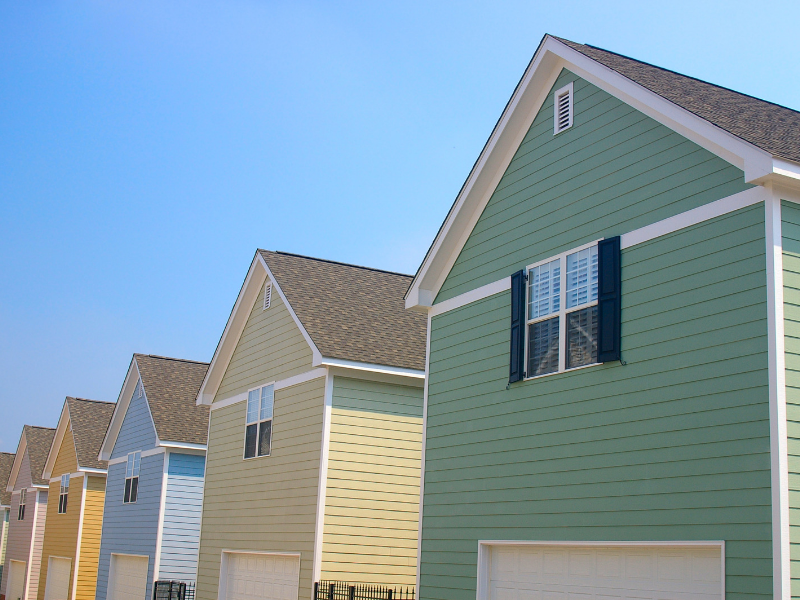 Image of newly installed siding on homes. 