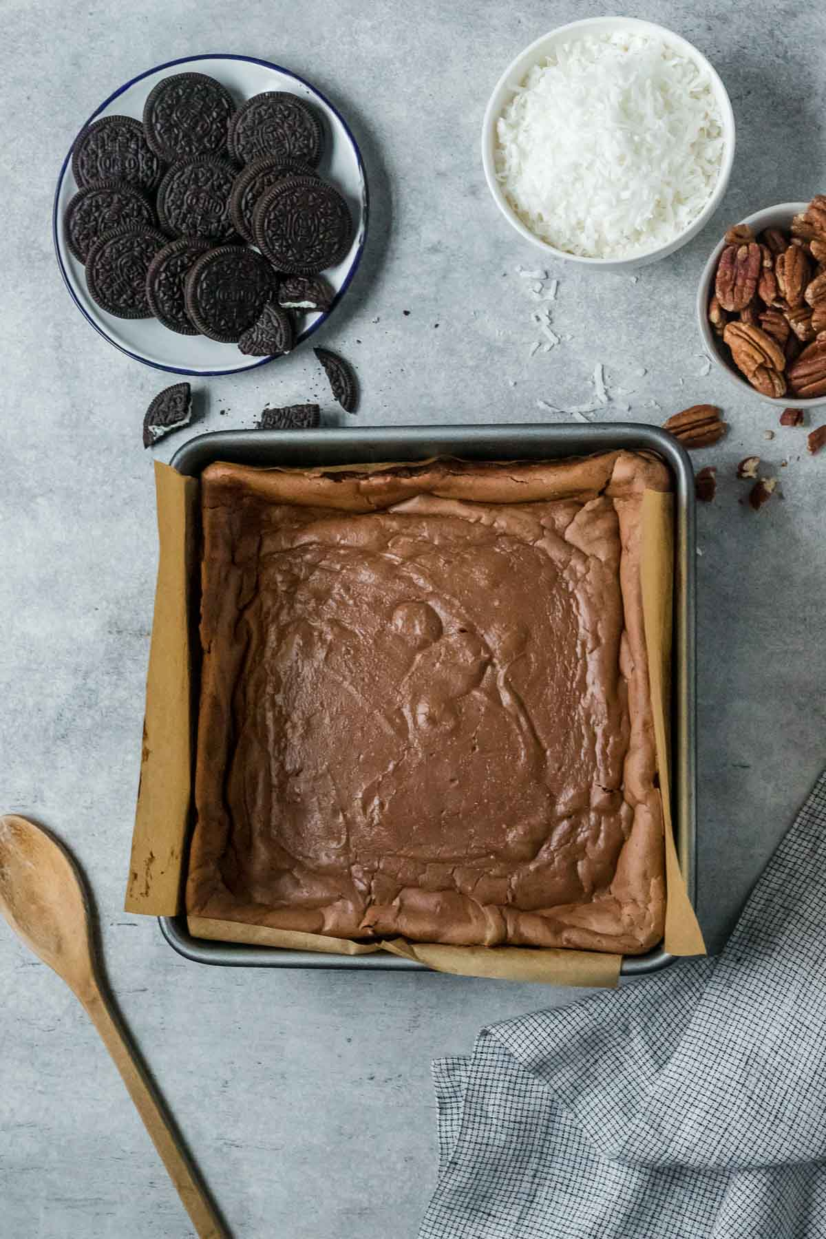 baked chocolate cheesecake bars in a pan