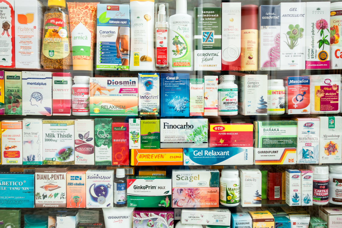 Retail shelf with a wide variety of dietary supplements and herbal products