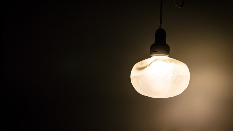 Bulb emitting warm light, illustrating lumen output and light distribution