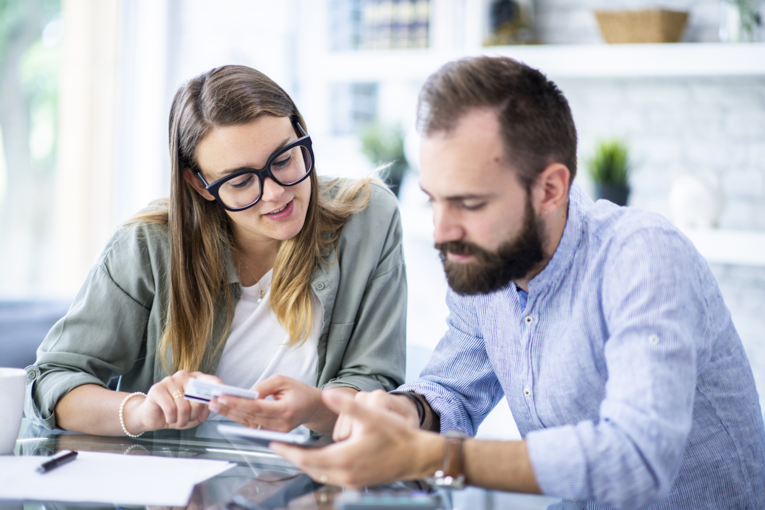 Business owners comparing brokers.