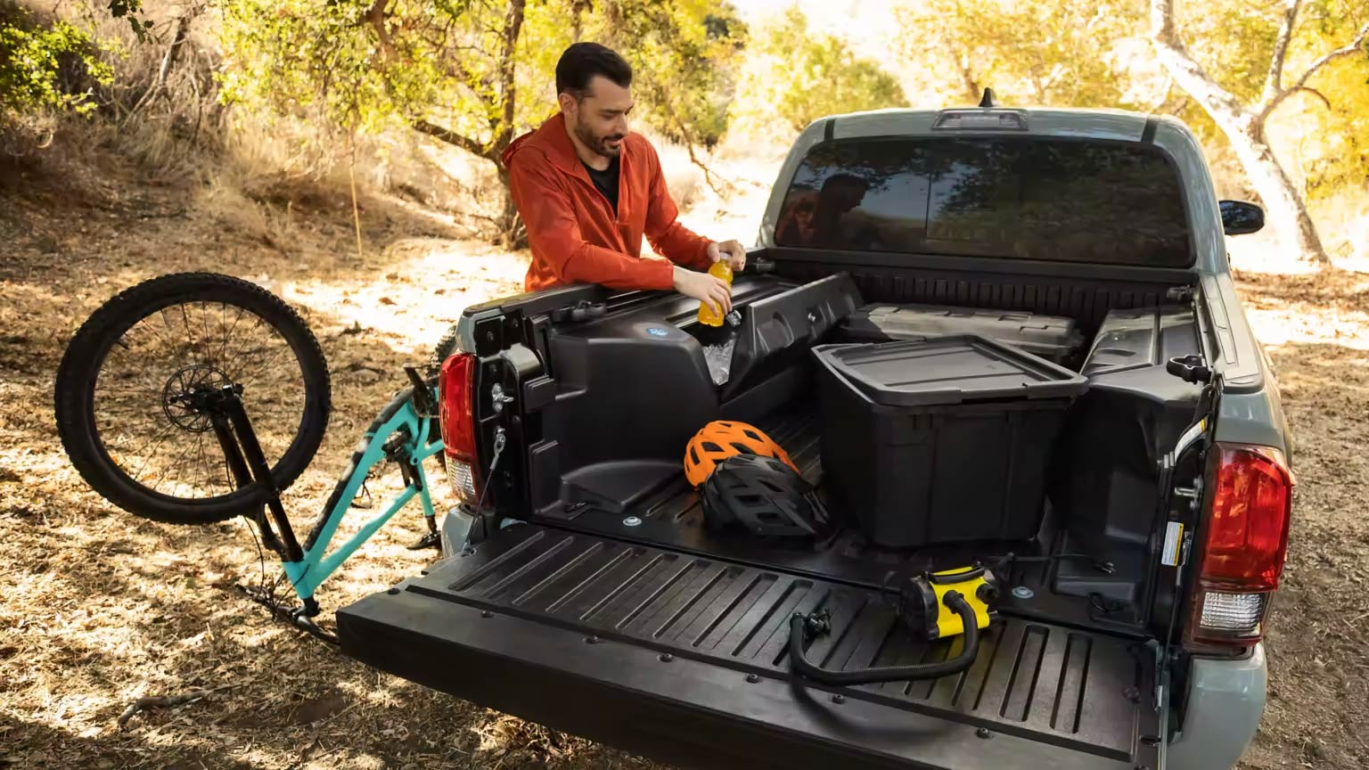 Toyota Tacoma With Gear In Back, having more space then the Ford Ranger.