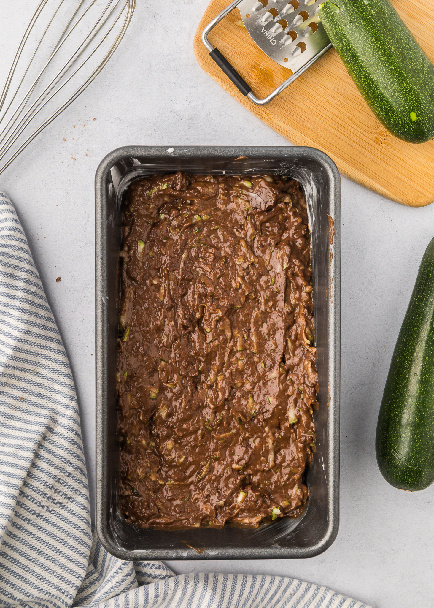 unbaked chocolate zucchini bread in loaf pan