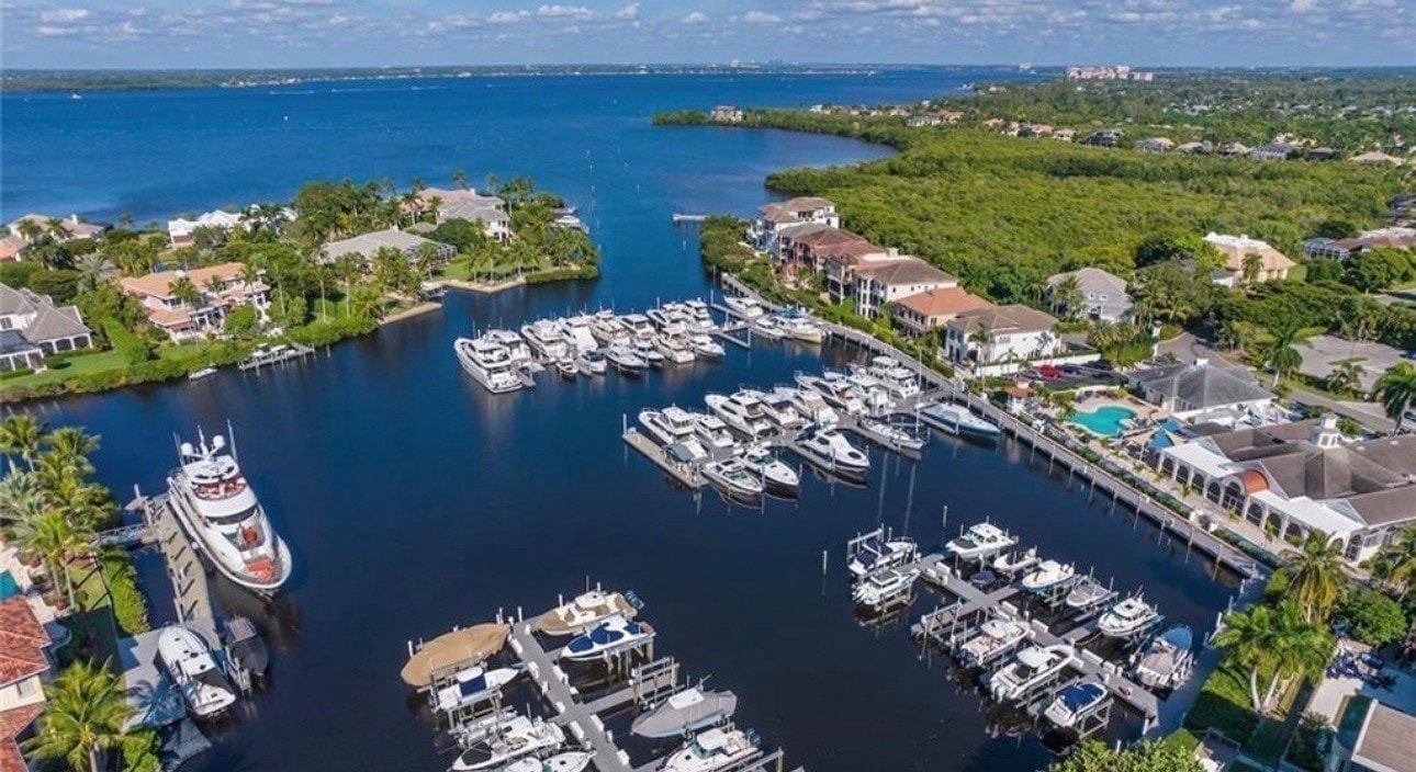 Residents are enjoying kayaking in the calm waters of a beautifully secluded natural harbor, surrounded by lush woodlands and diverse wildlife. This serene setting, located near St. Charles Harbour in Fort Myers, FL, offers a perfect escape for families and locals alike.