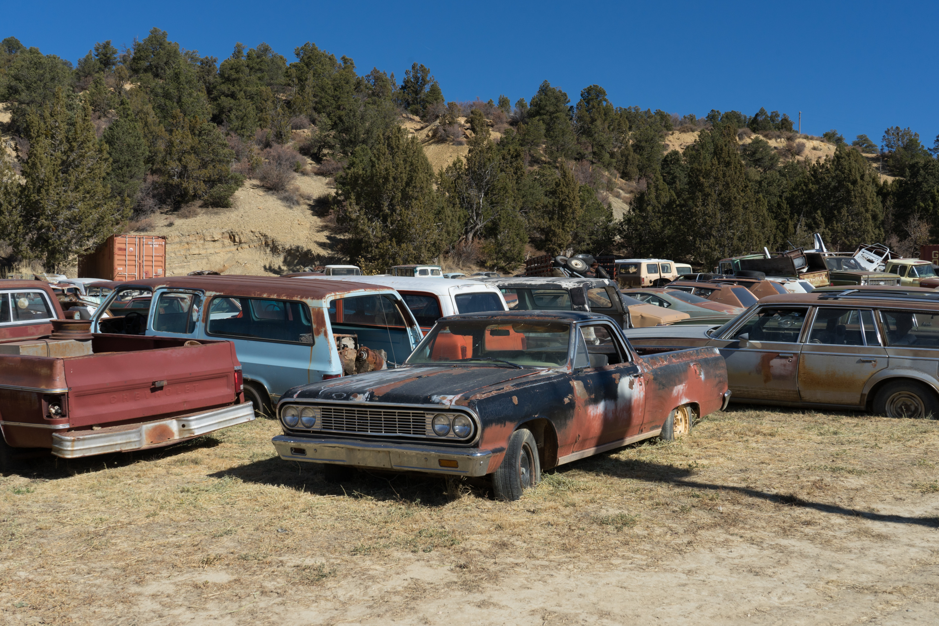 Cash from unwanted cars in a junkyard
