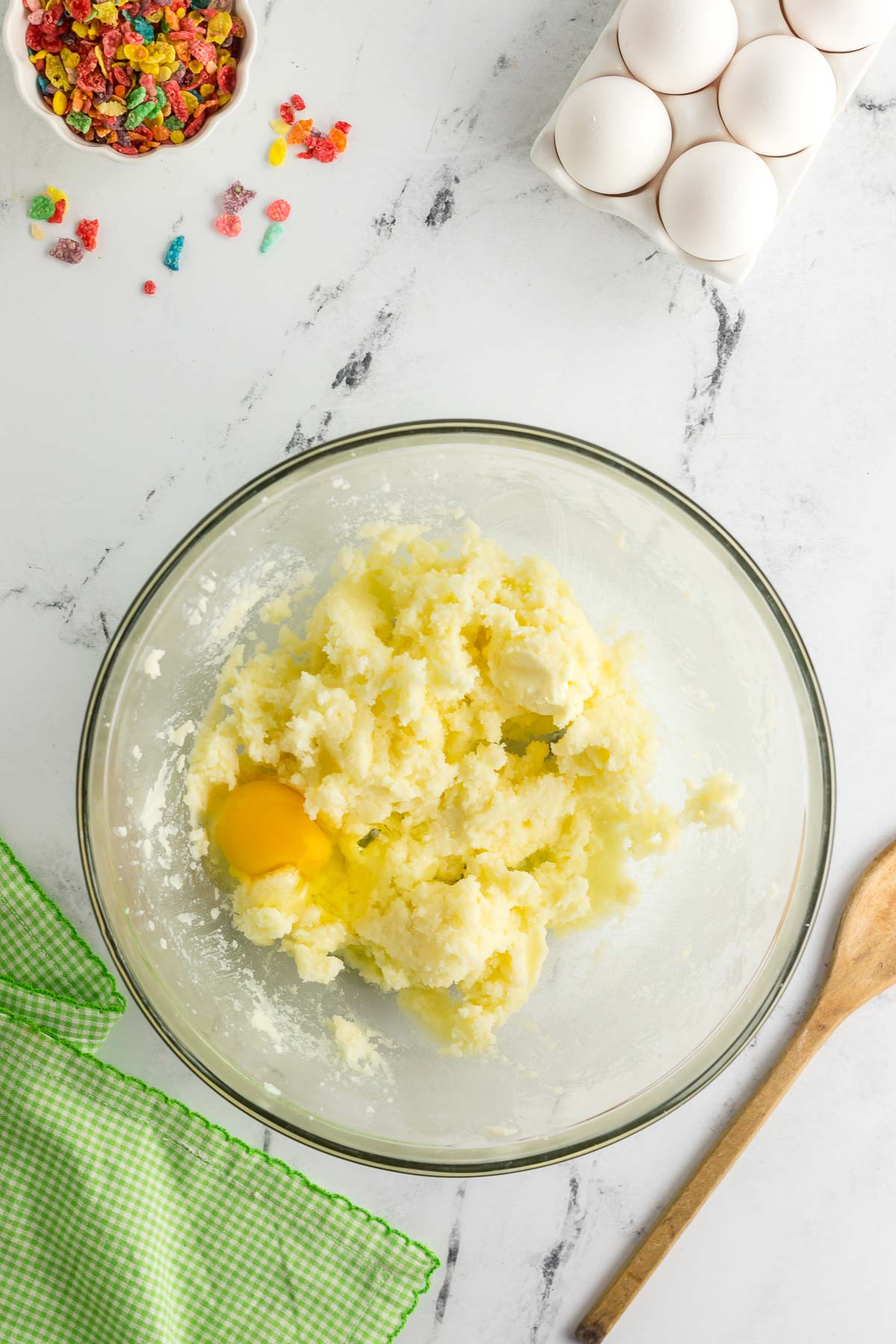 egg added to bowl of creamed butter and sugar