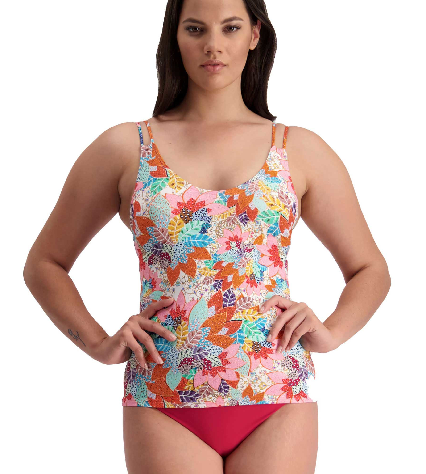 mix and match comfortable tankinis and feel beautiful shown in print top and plain bikini bottoms. model with long torso