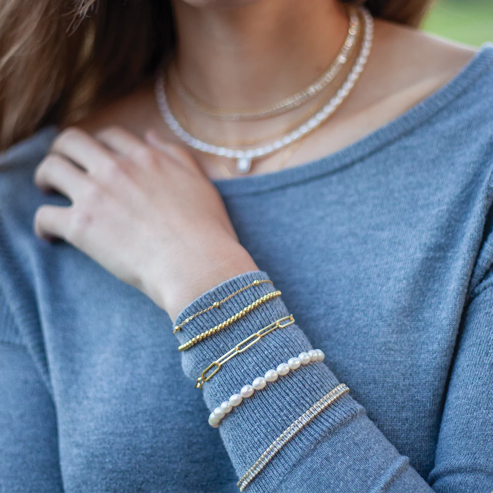 girlfriend wearing necklace and bracelet