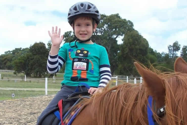 Child riding horse - RDA - Equestrian activities for the disabled