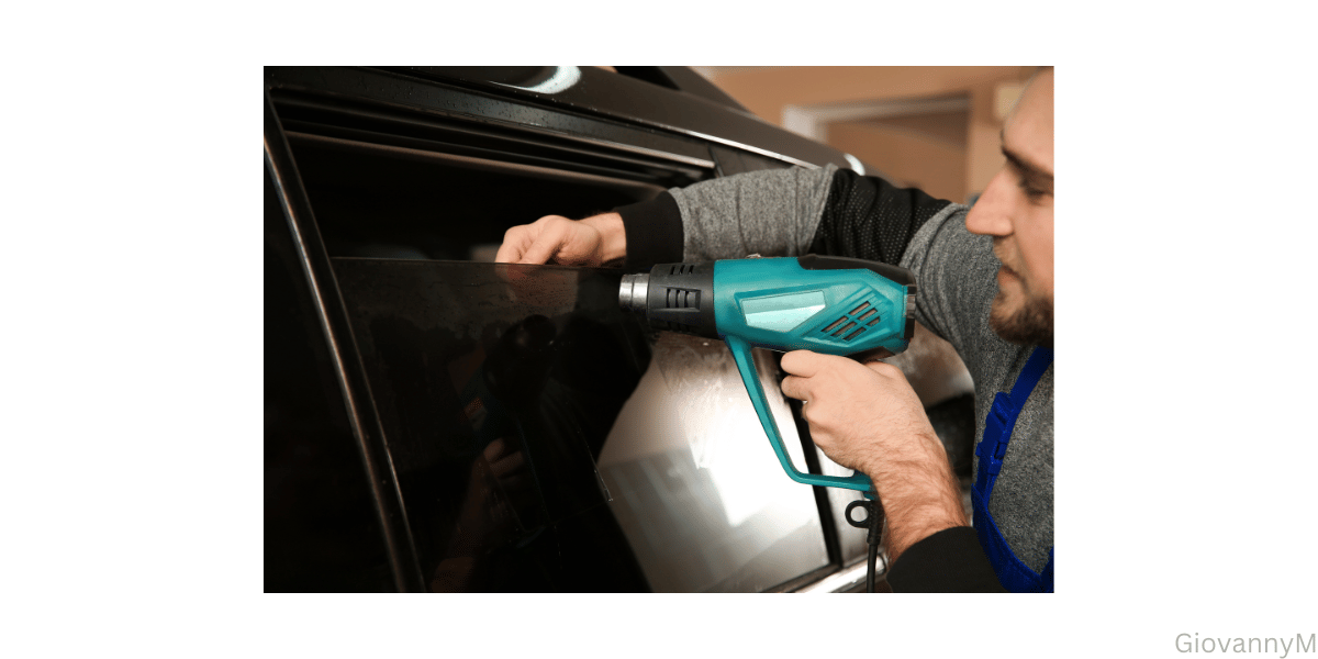 hot water, hair dryer, or more steam can help loosen glue on tinted windows.