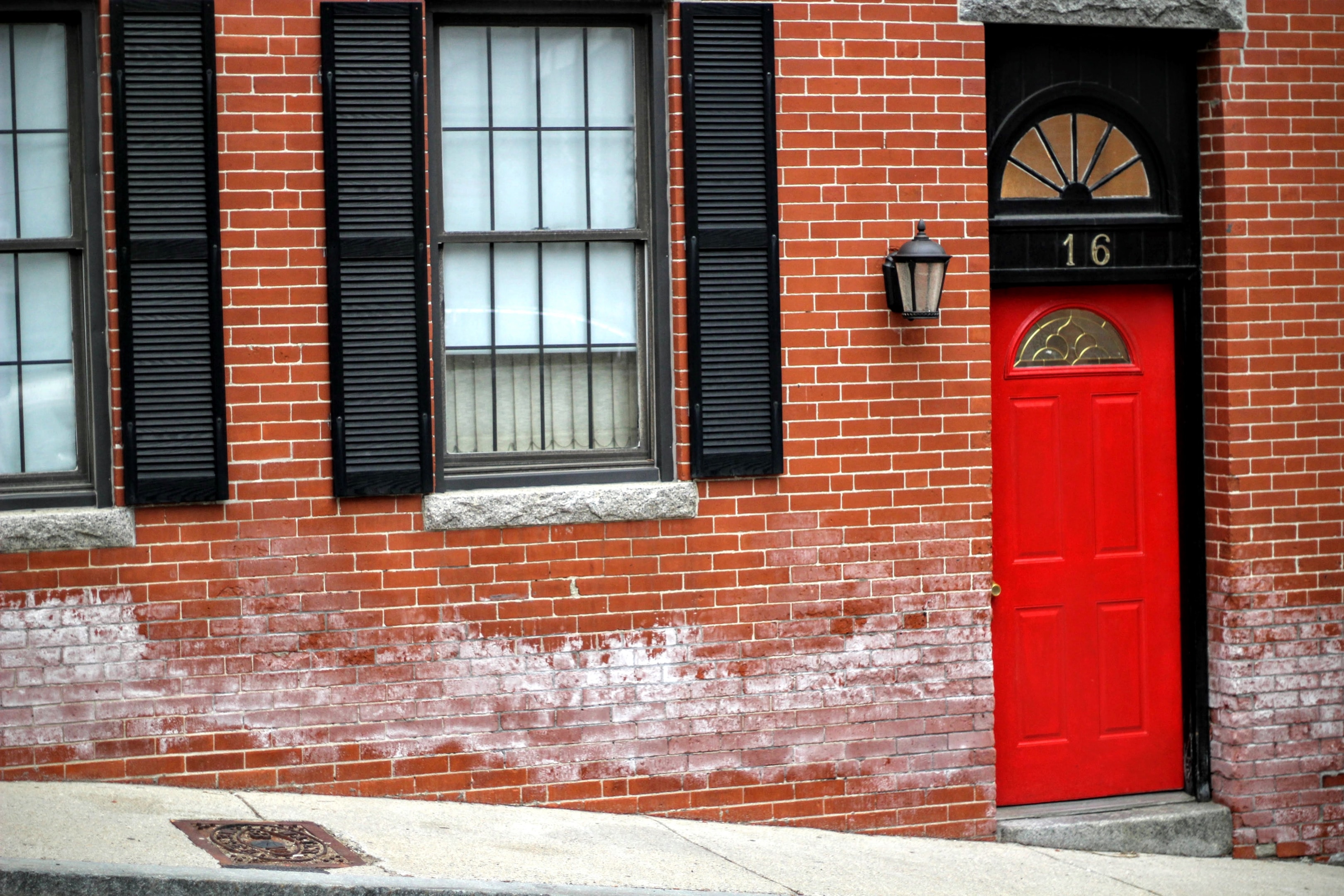 A brick building - https://www.freepik.com/free-photo/red-entrance-door-brick-building-showing-number-sixteen-street-with-glass-windows_7920998.htm#fromView=search&page=1&position=0&uuid=bf11e5fb-49cc-414a-8848-2ec31c733c79&query=FIRE+uk