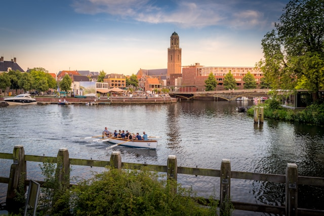 Rowboat in front of the tower of Zwolle in the summer
