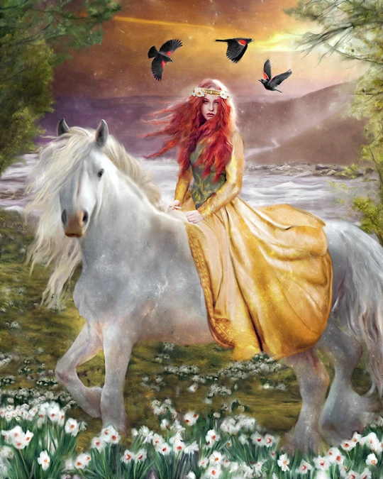 Goddess Rhiannon atop of a white horse wearing a gold dress. Her red hair is flowing in the wind while three crows circle her head. She is riding through a field of white flowers with trees around it.
