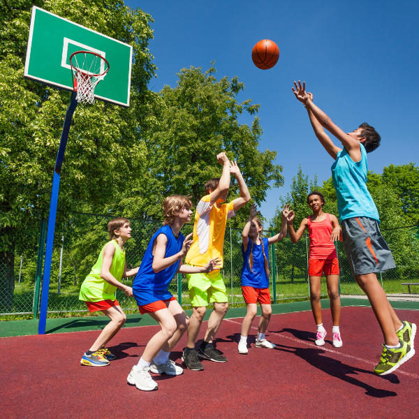 An image showing a fenced yard with children playing safely.